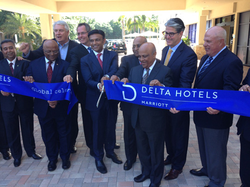 D.J. Rama, president of JHM Hotels, cuts the ribbon at Delta Orlando Lake Buena Vista on April 21.